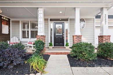 This beautifully-maintained 4-bedroom home with a welcoming on The Peninsula Club in North Carolina - for sale on GolfHomes.com, golf home, golf lot