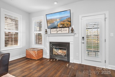 This beautifully-maintained 4-bedroom home with a welcoming on The Peninsula Club in North Carolina - for sale on GolfHomes.com, golf home, golf lot