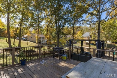 Beautifully updated 2,600 +/- Sq Ft 4 Bedroom, 3 Bathroom home on Raintree Country Club in Missouri - for sale on GolfHomes.com, golf home, golf lot