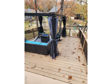 Beautifully updated 2,600 +/- Sq Ft 4 Bedroom, 3 Bathroom home on Raintree Country Club in Missouri - for sale on GolfHomes.com, golf home, golf lot