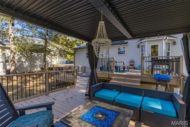 Beautifully updated 2,600 +/- Sq Ft 4 Bedroom, 3 Bathroom home on Raintree Country Club in Missouri - for sale on GolfHomes.com, golf home, golf lot