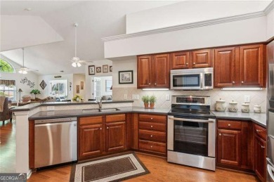 Welcome to your dream home in the highly desirable Muirfield on Windermere Golf Club in Georgia - for sale on GolfHomes.com, golf home, golf lot