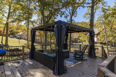 Beautifully updated 2,600 +/- Sq Ft 4 Bedroom, 3 Bathroom home on Raintree Country Club in Missouri - for sale on GolfHomes.com, golf home, golf lot