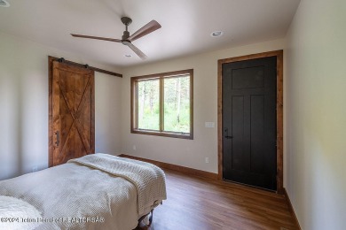 Custom-built new construction home nestled among the trees of on Star Valley RV Golf Course in Wyoming - for sale on GolfHomes.com, golf home, golf lot