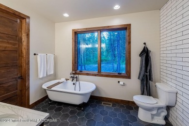 Custom-built new construction home nestled among the trees of on Star Valley RV Golf Course in Wyoming - for sale on GolfHomes.com, golf home, golf lot