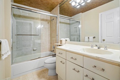 Gorgeous ground-level condo boasting picturesque panoramic lake on Broken Sound Golf and Club  in Florida - for sale on GolfHomes.com, golf home, golf lot