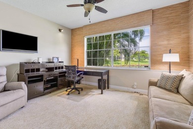 Gorgeous ground-level condo boasting picturesque panoramic lake on Broken Sound Golf and Club  in Florida - for sale on GolfHomes.com, golf home, golf lot