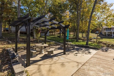 Beautifully updated 2,600 +/- Sq Ft 4 Bedroom, 3 Bathroom home on Raintree Country Club in Missouri - for sale on GolfHomes.com, golf home, golf lot