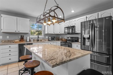 Beautifully updated 2,600 +/- Sq Ft 4 Bedroom, 3 Bathroom home on Raintree Country Club in Missouri - for sale on GolfHomes.com, golf home, golf lot