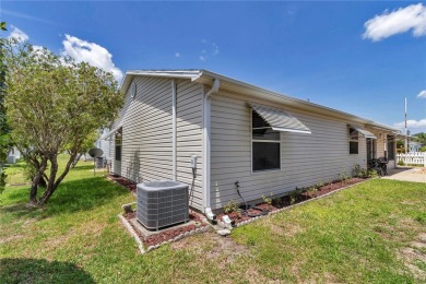 Welcome to this charming 2-bedroom, 2-bathroom home located in on The Links of Spruce Creek in Florida - for sale on GolfHomes.com, golf home, golf lot