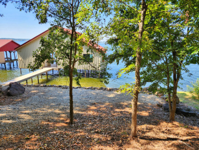 WATERFRONT LOT WITH AMAZING BOATHOUSE IN EAGLE'S BLUFF on Eagles Bluff Golf Course in Texas - for sale on GolfHomes.com, golf home, golf lot