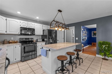 Beautifully updated 2,600 +/- Sq Ft 4 Bedroom, 3 Bathroom home on Raintree Country Club in Missouri - for sale on GolfHomes.com, golf home, golf lot