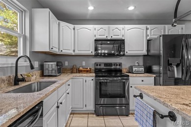 Beautifully updated 2,600 +/- Sq Ft 4 Bedroom, 3 Bathroom home on Raintree Country Club in Missouri - for sale on GolfHomes.com, golf home, golf lot