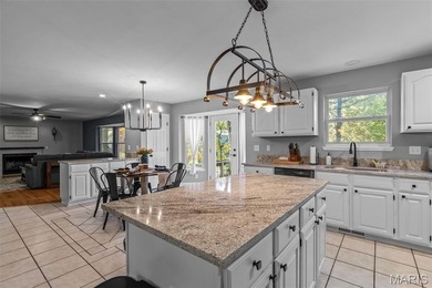 Beautifully updated 2,600 +/- Sq Ft 4 Bedroom, 3 Bathroom home on Raintree Country Club in Missouri - for sale on GolfHomes.com, golf home, golf lot