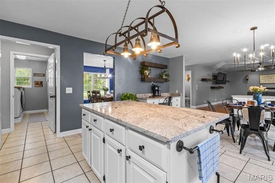 Beautifully updated 2,600 +/- Sq Ft 4 Bedroom, 3 Bathroom home on Raintree Country Club in Missouri - for sale on GolfHomes.com, golf home, golf lot