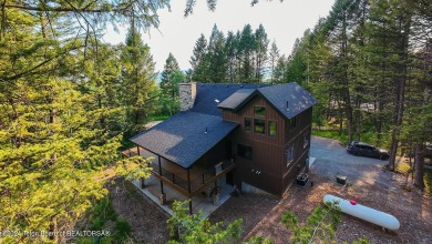 Custom-built new construction home nestled among the trees of on Star Valley RV Golf Course in Wyoming - for sale on GolfHomes.com, golf home, golf lot