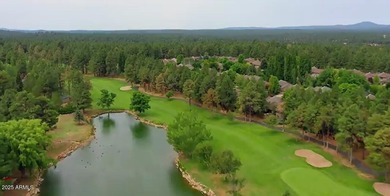 Flagstaff Charm with Water Views! Nestled among tall pines along on Aspen Valley Golf Club in Arizona - for sale on GolfHomes.com, golf home, golf lot