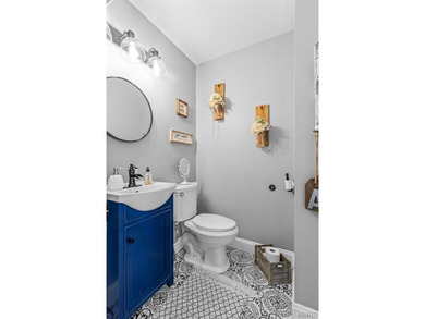 Beautifully updated 2,600 +/- Sq Ft 4 Bedroom, 3 Bathroom home on Raintree Country Club in Missouri - for sale on GolfHomes.com, golf home, golf lot