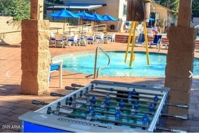 Flagstaff Charm with Water Views! Nestled among tall pines along on Aspen Valley Golf Club in Arizona - for sale on GolfHomes.com, golf home, golf lot