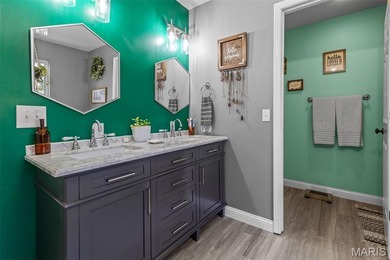 Beautifully updated 2,600 +/- Sq Ft 4 Bedroom, 3 Bathroom home on Raintree Country Club in Missouri - for sale on GolfHomes.com, golf home, golf lot