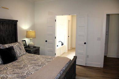 Move in ready in Lake Caroline. This thoughtfully designed home on Lake Caroline Golf Club in Mississippi - for sale on GolfHomes.com, golf home, golf lot