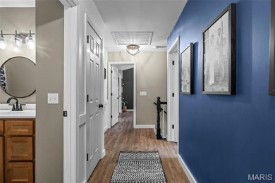 Beautifully updated 2,600 +/- Sq Ft 4 Bedroom, 3 Bathroom home on Raintree Country Club in Missouri - for sale on GolfHomes.com, golf home, golf lot