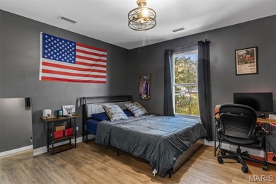 Beautifully updated 2,600 +/- Sq Ft 4 Bedroom, 3 Bathroom home on Raintree Country Club in Missouri - for sale on GolfHomes.com, golf home, golf lot