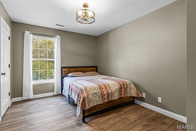 Beautifully updated 2,600 +/- Sq Ft 4 Bedroom, 3 Bathroom home on Raintree Country Club in Missouri - for sale on GolfHomes.com, golf home, golf lot