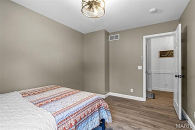 Beautifully updated 2,600 +/- Sq Ft 4 Bedroom, 3 Bathroom home on Raintree Country Club in Missouri - for sale on GolfHomes.com, golf home, golf lot