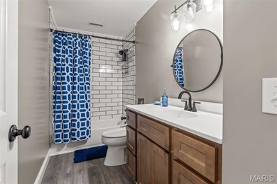 Beautifully updated 2,600 +/- Sq Ft 4 Bedroom, 3 Bathroom home on Raintree Country Club in Missouri - for sale on GolfHomes.com, golf home, golf lot