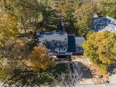 Beautifully updated 2,600 +/- Sq Ft 4 Bedroom, 3 Bathroom home on Raintree Country Club in Missouri - for sale on GolfHomes.com, golf home, golf lot