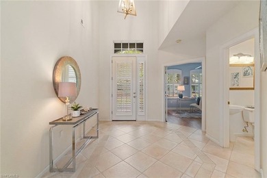 Sun-drenched southern exposure, a stunning updated pool, and on Shadow Wood Country Club in Florida - for sale on GolfHomes.com, golf home, golf lot