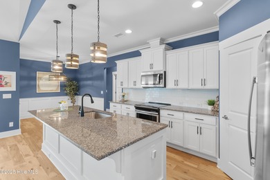 Begin your next chapter in this beautifully maintained home on Members Club At St. James Plantation in North Carolina - for sale on GolfHomes.com, golf home, golf lot