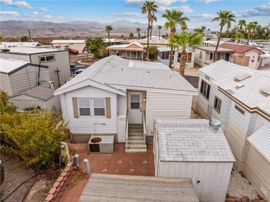 Enjoy comfortable, resort-style living in this fully furnished on Riverview Golf Course in Arizona - for sale on GolfHomes.com, golf home, golf lot
