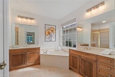 Sun-drenched southern exposure, a stunning updated pool, and on Shadow Wood Country Club in Florida - for sale on GolfHomes.com, golf home, golf lot