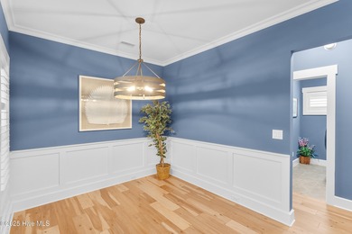 Begin your next chapter in this beautifully maintained home on Members Club At St. James Plantation in North Carolina - for sale on GolfHomes.com, golf home, golf lot