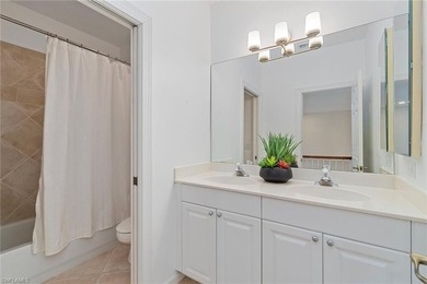 Sun-drenched southern exposure, a stunning updated pool, and on Shadow Wood Country Club in Florida - for sale on GolfHomes.com, golf home, golf lot