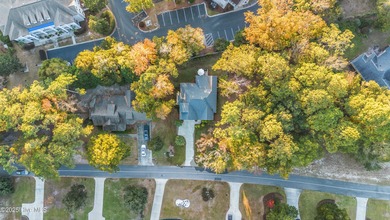 Prepare to be amazed by the craftsman design and luxury finishes on Sea Trail Golf Resort in North Carolina - for sale on GolfHomes.com, golf home, golf lot