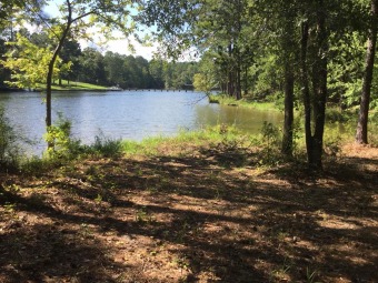Live The Lake Life! This wooded lake front lot showcases 245 for sale on GolfHomes.com
