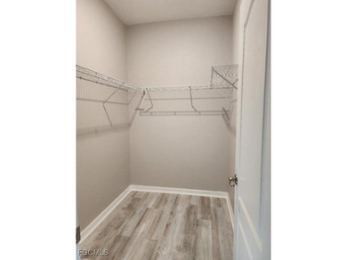 Charming 3-Bedroom, 3-Bath Lake View Home with Assumable FHA on River Hall Country Club in Florida - for sale on GolfHomes.com, golf home, golf lot