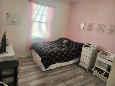 Charming 3-Bedroom, 3-Bath Lake View Home with Assumable FHA on River Hall Country Club in Florida - for sale on GolfHomes.com, golf home, golf lot