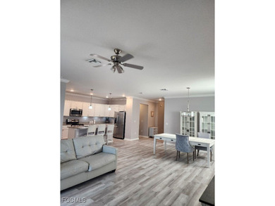 Charming 3-Bedroom, 3-Bath Lake View Home with Assumable FHA on River Hall Country Club in Florida - for sale on GolfHomes.com, golf home, golf lot