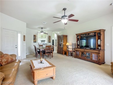 This rare Gardenia model in THE MEADOWS section of HERONS GLEN on Herons Glen Golf and Country Club in Florida - for sale on GolfHomes.com, golf home, golf lot