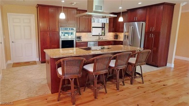 DON'T MISS this Showstopper! 3 BR / 3 FULL BATHS / 2 CAR GARAGE on Whiskey Creek Country Club in Florida - for sale on GolfHomes.com, golf home, golf lot