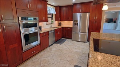 DON'T MISS this Showstopper! 3 BR / 3 FULL BATHS / 2 CAR GARAGE on Whiskey Creek Country Club in Florida - for sale on GolfHomes.com, golf home, golf lot