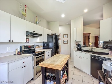 This rare Gardenia model in THE MEADOWS section of HERONS GLEN on Herons Glen Golf and Country Club in Florida - for sale on GolfHomes.com, golf home, golf lot