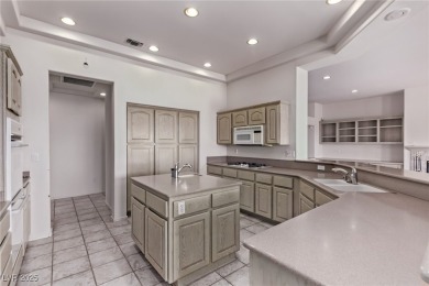 Step through 10-foot entry doors into vaulted ceilings  enjoy on Highland Falls Golf Club in Nevada - for sale on GolfHomes.com, golf home, golf lot