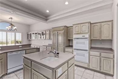 Step through 10-foot entry doors into vaulted ceilings  enjoy on Highland Falls Golf Club in Nevada - for sale on GolfHomes.com, golf home, golf lot