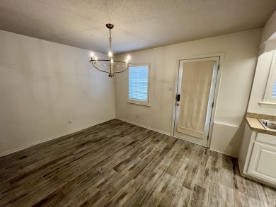 This spacious and updated condominium is located at The Commons on Spring Hill College Golf Course in Alabama - for sale on GolfHomes.com, golf home, golf lot