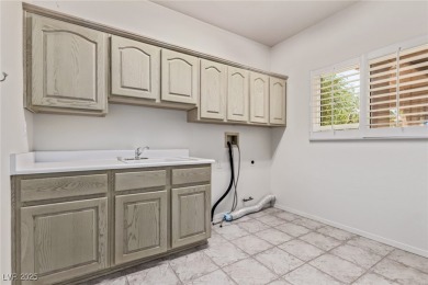 Step through 10-foot entry doors into vaulted ceilings  enjoy on Highland Falls Golf Club in Nevada - for sale on GolfHomes.com, golf home, golf lot